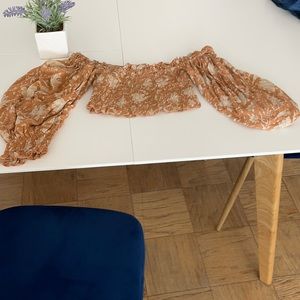 Peach patterned off the shoulder crop top. XS Jan’s Pirate Booty